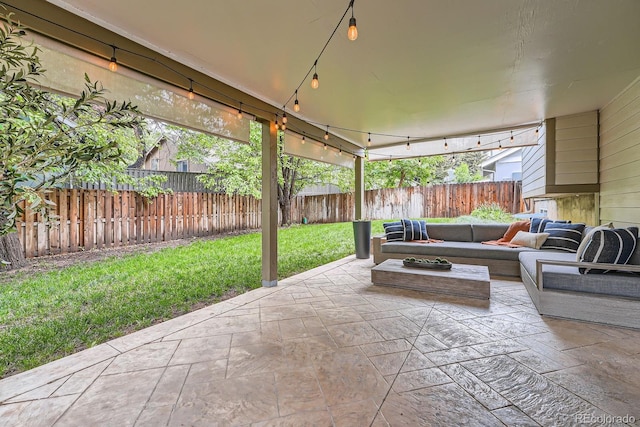 6443 S Florence Way, Englewood, CO 80111 - fenced backyard featuring outdoor lounge area and a patio area