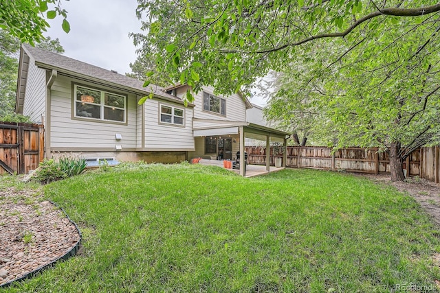 6443 S Florence Way, Englewood, CO 80111 - back of house featuring a patio and a fenced backyard