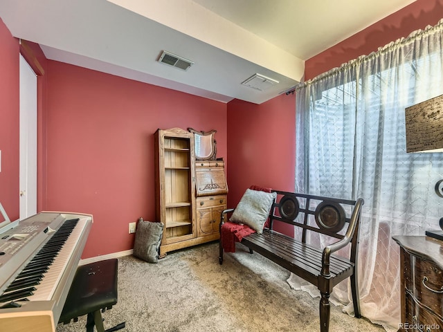 living area with carpet floors and baseboards