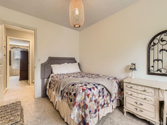 bedroom featuring light colored carpet