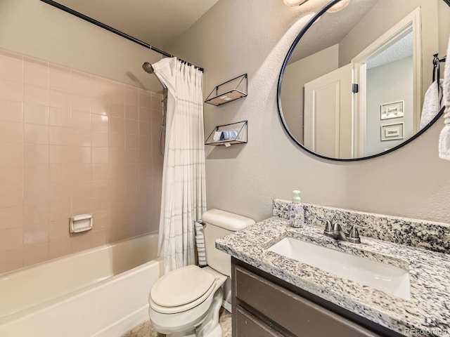 full bathroom featuring toilet, vanity, shower / bath combo with shower curtain, and a textured wall