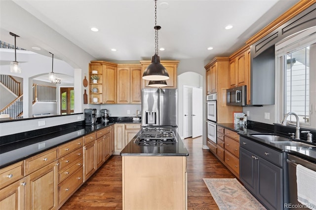 3048 Deer Creek Ranch Loop, Parker, CO 80138 - kitchen featuring arched walkways, appliances with stainless steel finishes, dark countertops, dark wood-style flooring, and open shelves