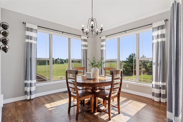 3048 Deer Creek Ranch Loop, Parker, CO 80138 - dining area featuring a chandelier and dark wood-type flooring