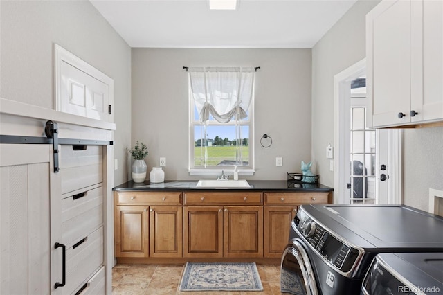 3048 Deer Creek Ranch Loop, Parker, CO 80138 - laundry area featuring cabinet space and separate washer and dryer