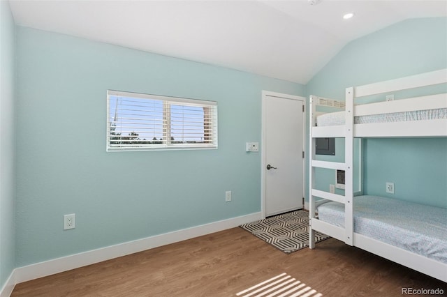 3048 Deer Creek Ranch Loop, Parker, CO 80138 - unfurnished bedroom with wood finished floors, lofted ceiling, and recessed lighting