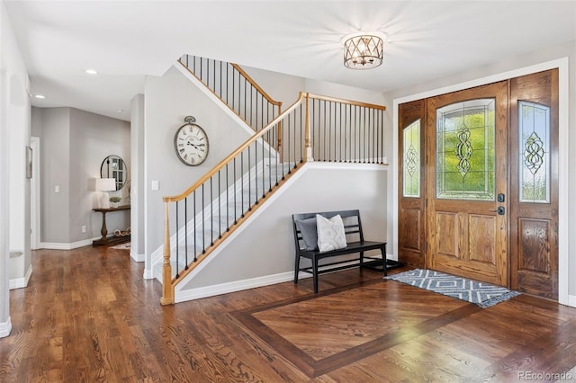 3048 Deer Creek Ranch Loop, Parker, CO 80138 - entryway with stairway, wood finished floors, a chandelier, and recessed lighting