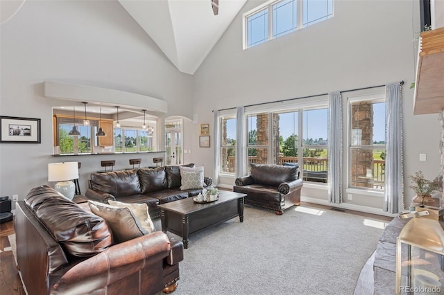 3048 Deer Creek Ranch Loop, Parker, CO 80138 - living area with high vaulted ceiling, arched walkways, and a chandelier
