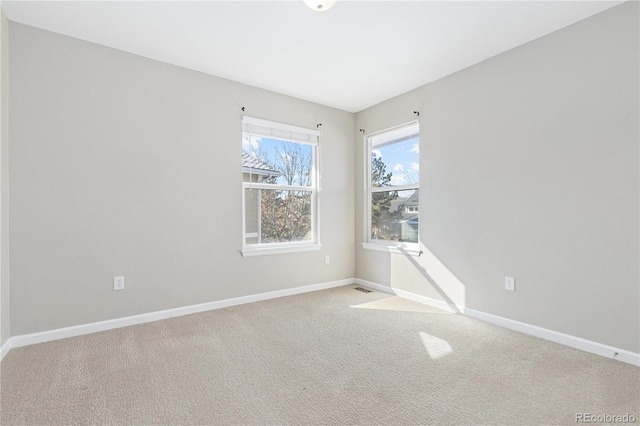 view of carpeted spare room