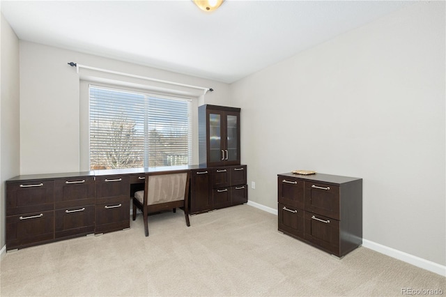 home office featuring light colored carpet