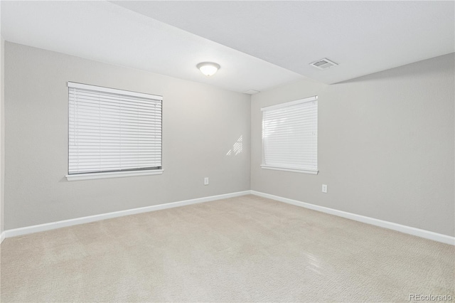 view of carpeted spare room