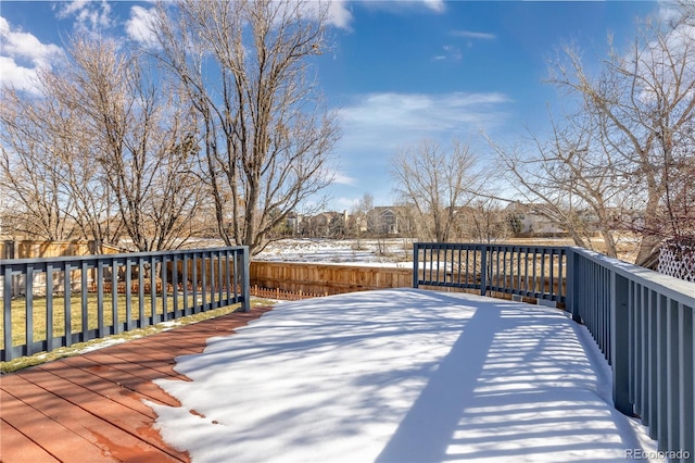 view of snow covered deck