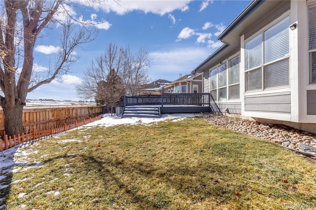 view of yard featuring a wooden deck