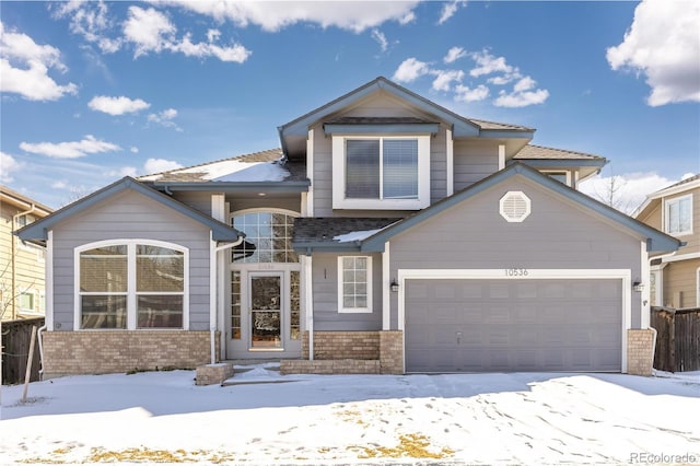 view of front of property with a garage