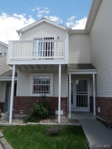 view of front of house with a balcony