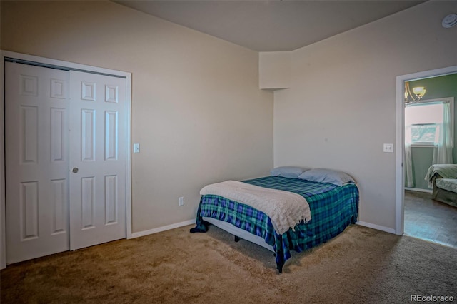 carpeted bedroom featuring a closet