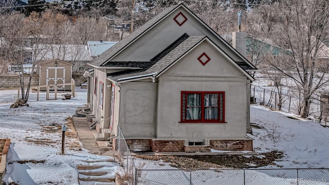 view of snow covered property