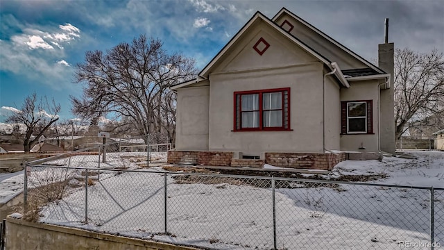 view of snow covered property