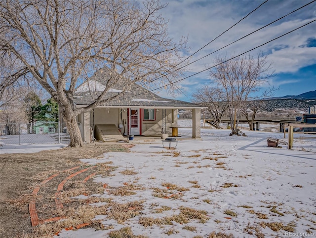 view of front of house with a mountain view