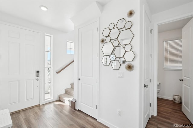 foyer entrance featuring hardwood / wood-style floors