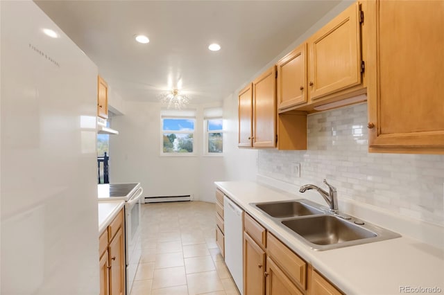 kitchen featuring light tile patterned flooring, light brown cabinets, sink, a baseboard heating unit, and white appliances