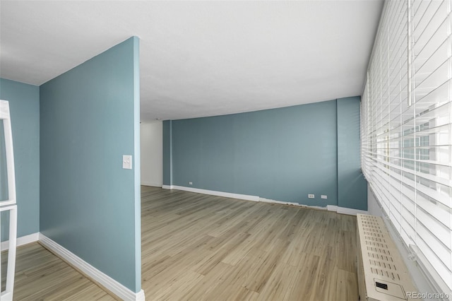 1196 N Grant St Unit 705, Denver, CO 80203 - empty room featuring wood finished floors and baseboards