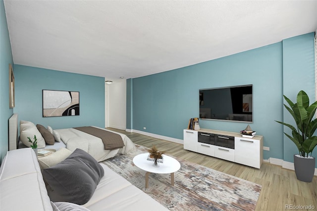 1196 N Grant St Unit 705, Denver, CO 80203 - living room featuring light wood-style flooring and baseboards