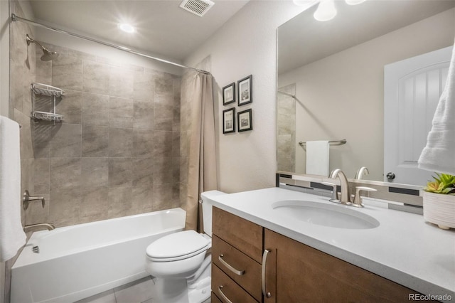 6015 Trappers Tale Ct, Colorado Springs, CO 80923 - bathroom featuring vanity, shower / bath combo, toilet, and tile patterned flooring