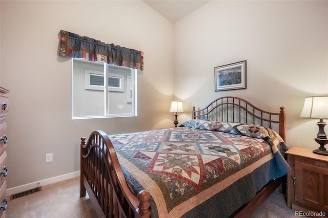 6015 Trappers Tale Ct, Colorado Springs, CO 80923 - bedroom featuring carpet floors, baseboards, and vaulted ceiling