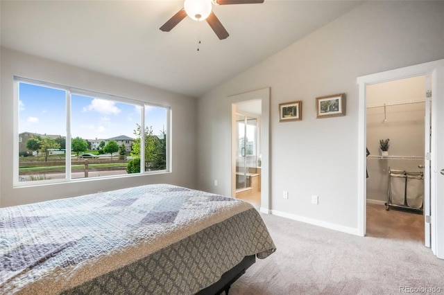 6015 Trappers Tale Ct, Colorado Springs, CO 80923 - carpeted bedroom with lofted ceiling, multiple windows, a spacious closet, baseboards, and a ceiling fan