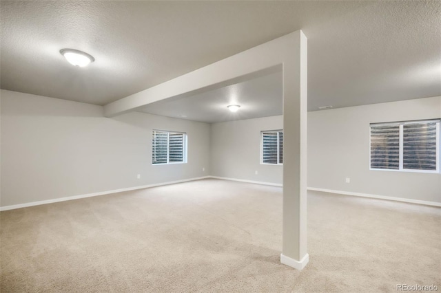 6015 Trappers Tale Ct, Colorado Springs, CO 80923 - carpeted empty room featuring a textured ceiling and baseboards