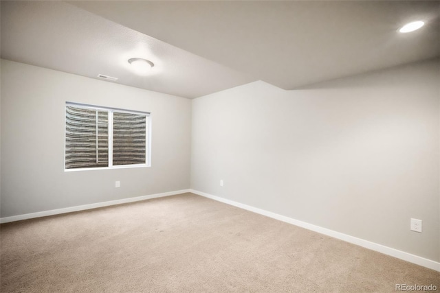 6015 Trappers Tale Ct, Colorado Springs, CO 80923 - empty room with light carpet, baseboards, and recessed lighting