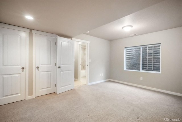 6015 Trappers Tale Ct, Colorado Springs, CO 80923 - unfurnished bedroom with carpet flooring, baseboards, and ensuite bathroom