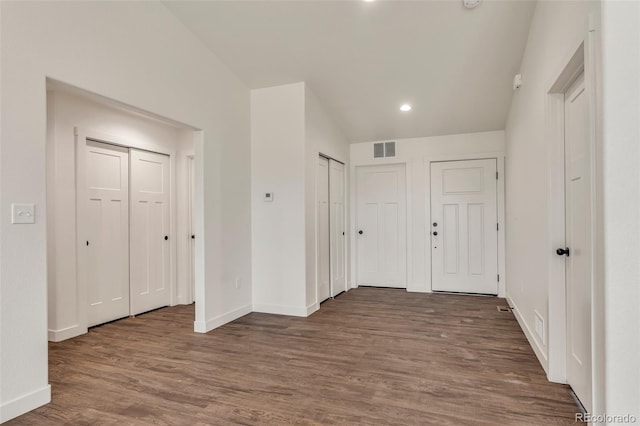 entrance foyer with baseboards, visible vents, wood finished floors, and recessed lighting