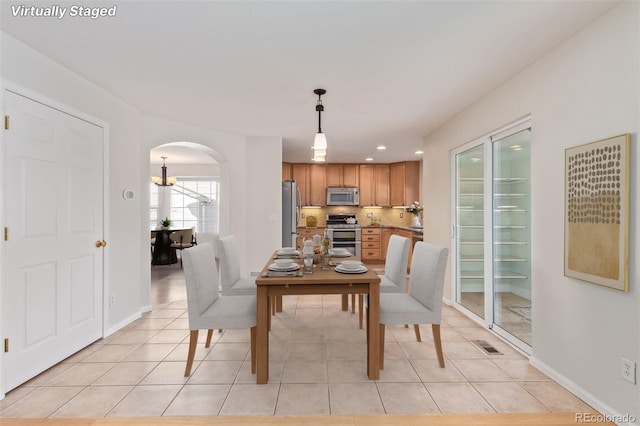 dining room featuring light tile patterned floors