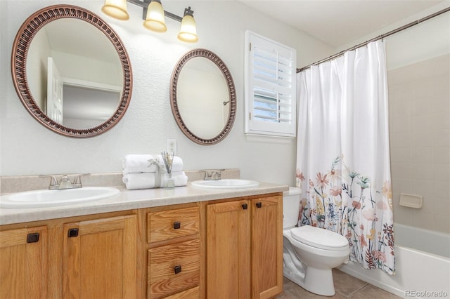 full bathroom featuring vanity, tile patterned floors, shower / bath combination with curtain, and toilet