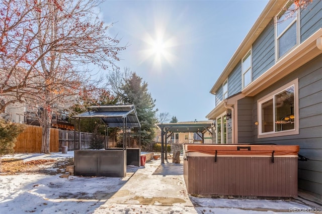 exterior space featuring a hot tub