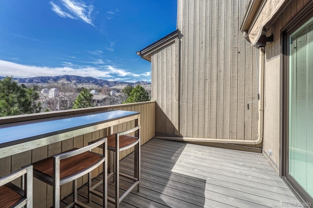 balcony featuring a mountain view