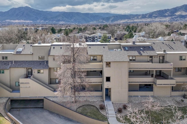 bird's eye view featuring a mountain view and a residential view