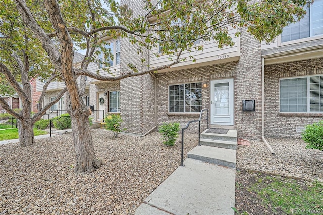 3033 W 107th Pl Unit D, Westminster, CO 80031 - property entrance with brick siding