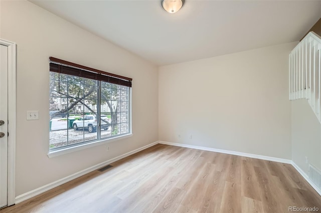 3033 W 107th Pl Unit D, Westminster, CO 80031 - spare room with light wood-style floors, baseboards, and visible vents