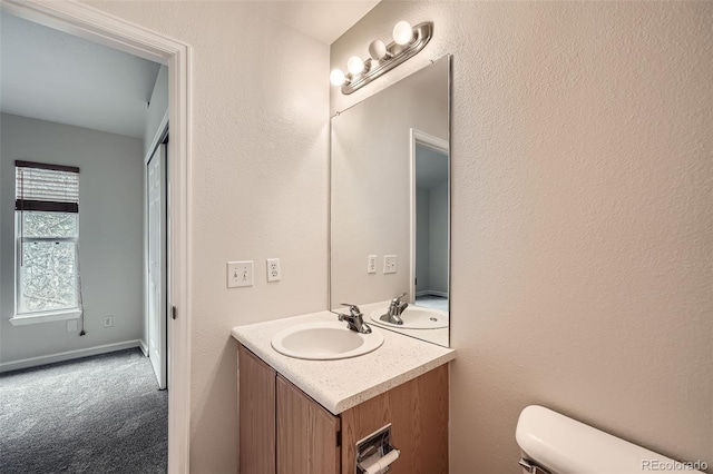 3033 W 107th Pl Unit D, Westminster, CO 80031 - half bathroom featuring vanity and toilet