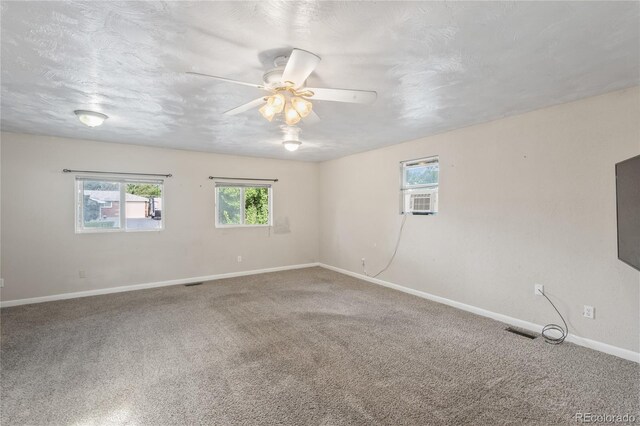 6077 Flower St, Arvada, CO 80004 - spare room with carpet floors, a ceiling fan, and cooling unit