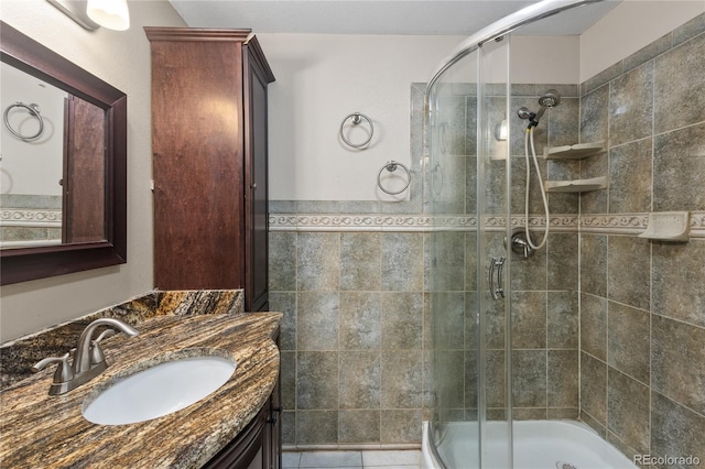 6077 Flower St, Arvada, CO 80004 - bathroom featuring a shower stall and vanity