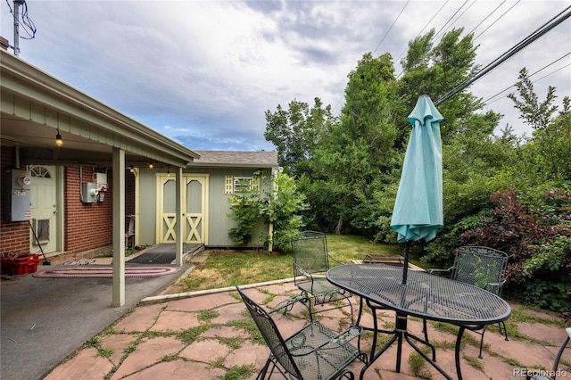 6077 Flower St, Arvada, CO 80004 - view of patio featuring outdoor dining area