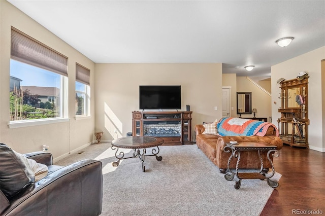 14119 W 89th Loop, Arvada, CO 80005 - living area featuring wood finished floors and baseboards