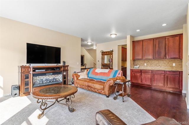 14119 W 89th Loop, Arvada, CO 80005 - living room featuring recessed lighting and dark wood-style flooring