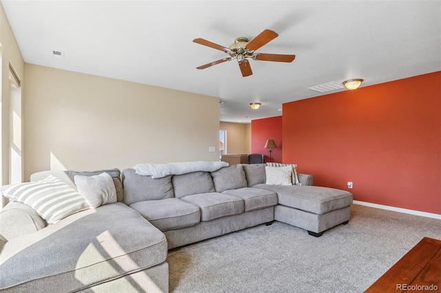 14119 W 89th Loop, Arvada, CO 80005 - carpeted living room featuring a ceiling fan and baseboards