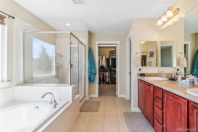 14119 W 89th Loop, Arvada, CO 80005 - full bath featuring a bath, a shower stall, double vanity, and tile patterned floors