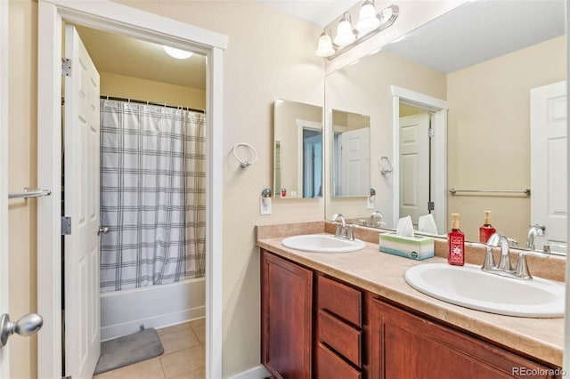 14119 W 89th Loop, Arvada, CO 80005 - full bathroom with double vanity, tile patterned floors, and shower / bath combo with shower curtain