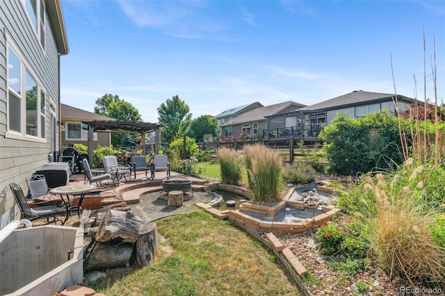 14119 W 89th Loop, Arvada, CO 80005 - view of yard featuring an outdoor fire pit, a patio, and a pergola